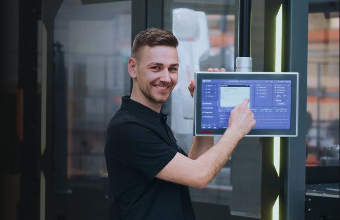 Employee working at a control unit